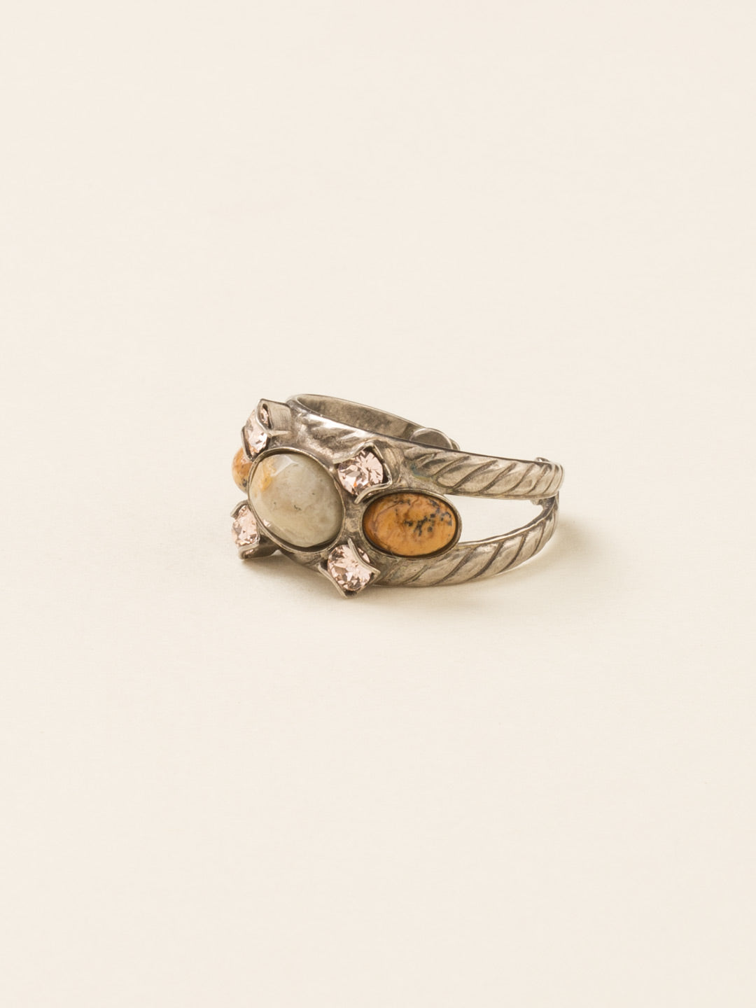 Oval Semi-Precious and Crystal Cocktail Ring - RDE7ASSND - <p>Oval semi-precious stones with crystal accents sit atop a braided double band. Due to the nature of natural, semi-precious stones, variations in color and pattern may occur. These variations make each Sorrelli piece one-of-a-kind! Ring size: 7 (US) From Sorrelli's Sand Dune collection in our Antique Silver-tone finish.</p>