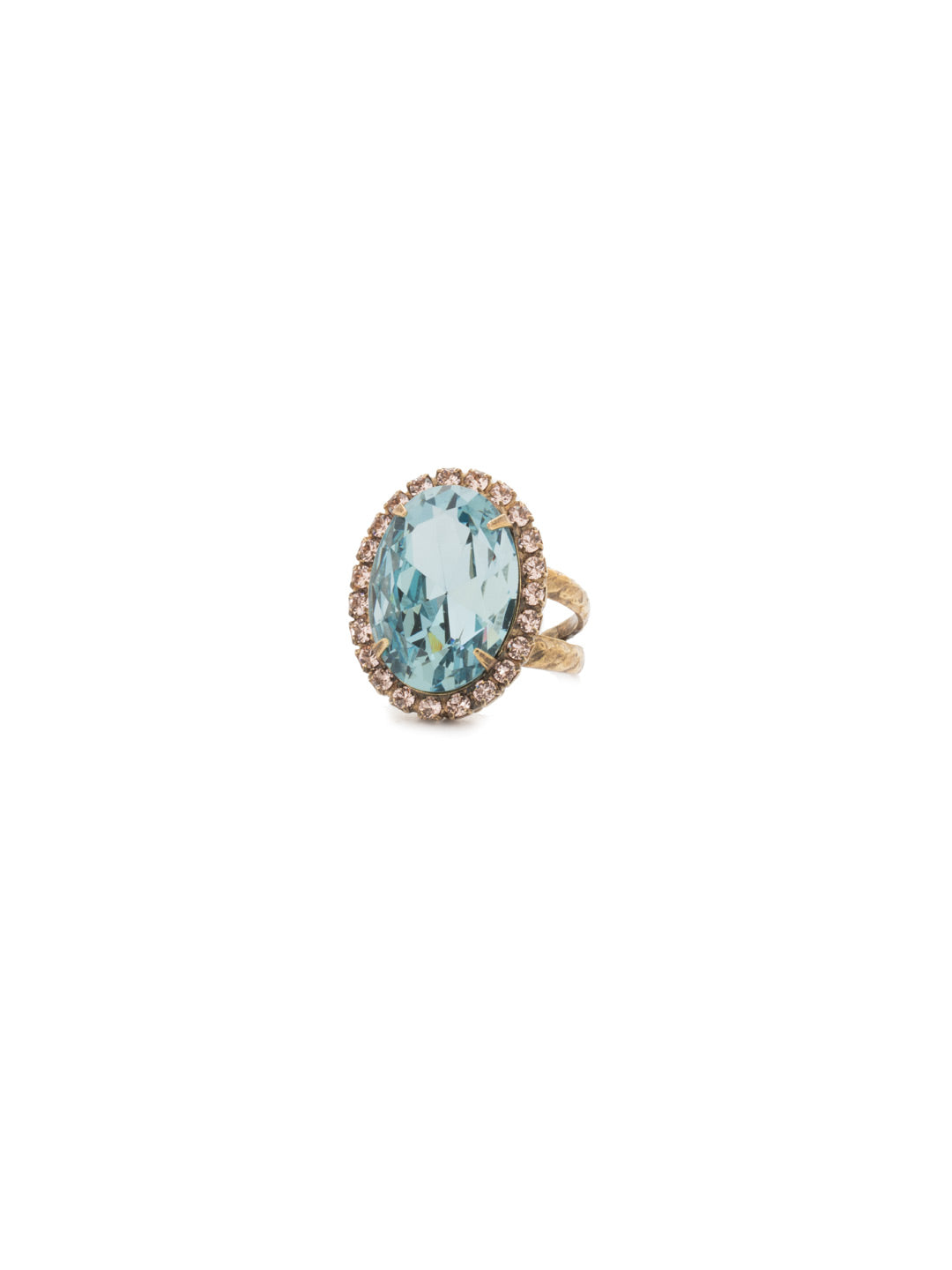 Classic Oval Cut Cocktail Ring - RDG70AGCMI - <p>A jewelry collection must! This glamorous ring features a bold oval cut center crystal surrounded by crystal accents that sits on a braided band. An antique-inspired classic. Ring size: 7 (US) From Sorrelli's Coastal Mist collection in our Antique Gold-tone finish.</p>