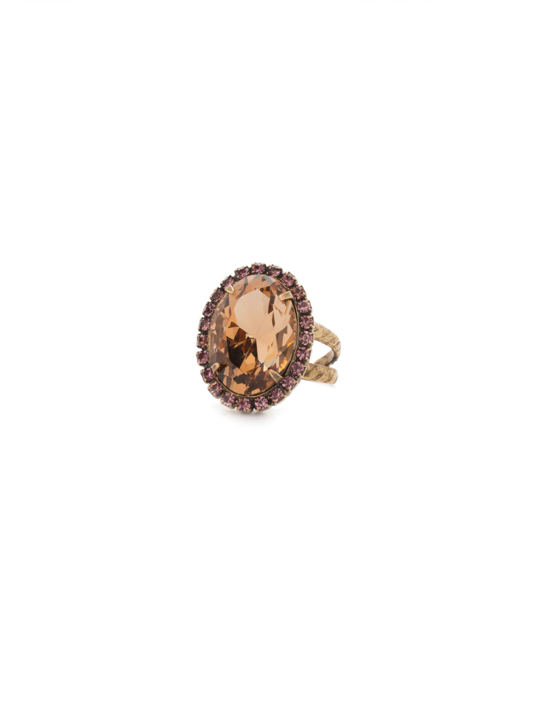 Classic Oval Cut Cocktail Ring - RDG70AGRB - <p>A jewelry collection must! This glamorous ring features a bold oval cut center crystal surrounded by crystal accents that sits on a braided band. An antique-inspired classic. Ring size: 7 (US) From Sorrelli's Rustic Bloom collection in our Antique Gold-tone finish.</p>