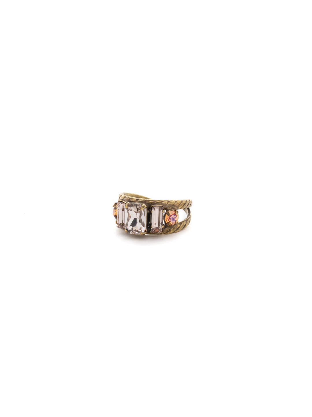 Petite Geo Cocktail Ring - RDG78AGAP - <p>Emerald-cut, baguette, and round crystals all sit in a row on this geometric ring. A braided, double band features a decorative metal design Ring size: 7 (US) From Sorrelli's Apricot Agate collection in our Antique Gold-tone finish.</p>