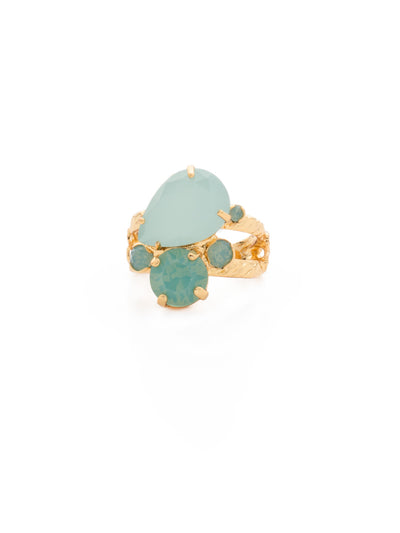 Tilted Teardrop Cluster Double Band Cocktail Ring - RDJ24BGPAC - <p>Our Tilted Teardrop Cluster Double Band Ring features a teardrop shaped crystal surrounded by multi-sized round crystals in a cluster pattern atop an intricate, braided double band. Ring size: 7 (US) From Sorrelli's Pacific Opal collection in our Bright Gold-tone finish.</p>