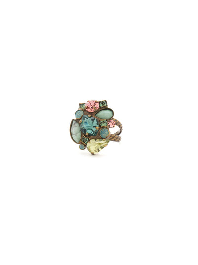 Contemporary Cluster Cocktail Ring - RDK15AGPOP - <p>A modern mixture, featuring multi-cut crystals and semi-precious stones in a cluster pattern atop a braided double-band featuring a decorative metal design. Ring size: 7 (US) From Sorrelli's Gem Pop collection in our Antique Gold-tone finish.</p>