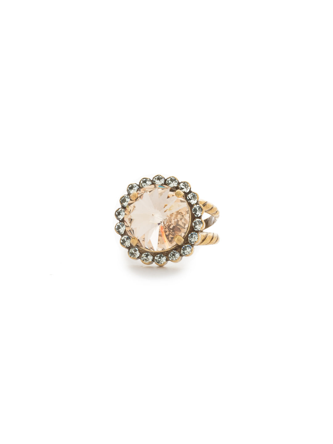 Aspen Cocktail Ring - RDS42AGWW - <p>This elegant ring features a round rivoli cut crystal encircled with brilliant rhinestones. Easy to dress up or down! Ring size: 7 (US) From Sorrelli's Washed Waterfront collection in our Antique Gold-tone finish.</p>